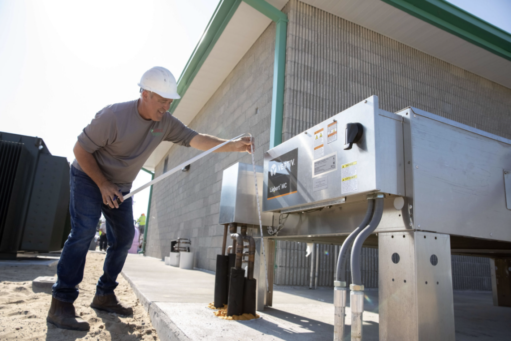 nate certified hvac technician working on a commercial hvac unit